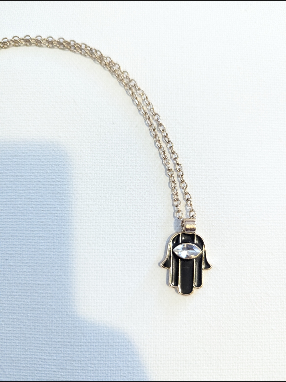 Hamsa Hand Pendant Necklace in Black and Gold
